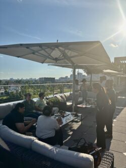 West Mermis attorneys and guests celebrating 9th anniversary at Houston happy hour event.