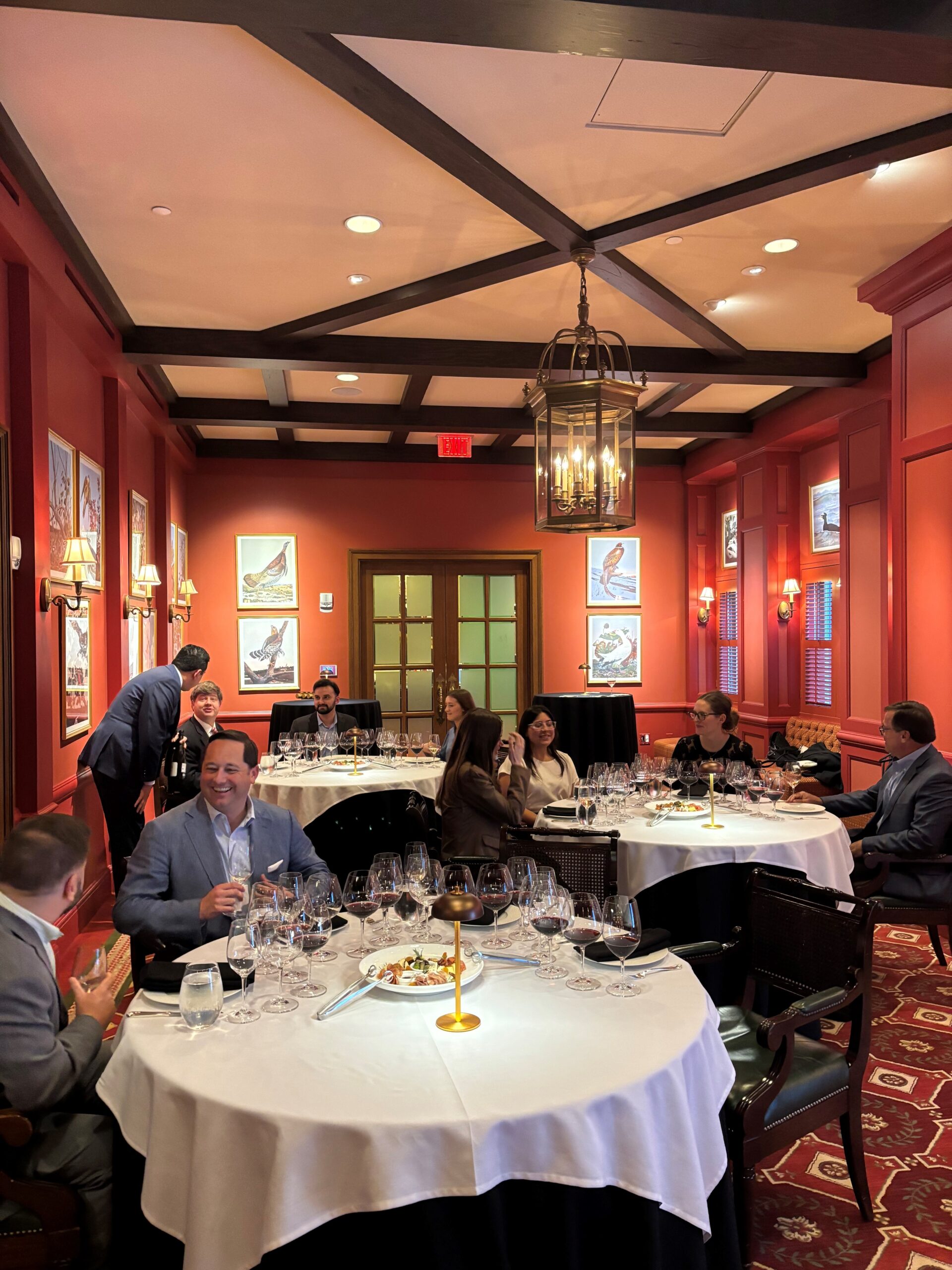 West Mermis attorneys and summer clerk at Houston law firm wine tasting event.